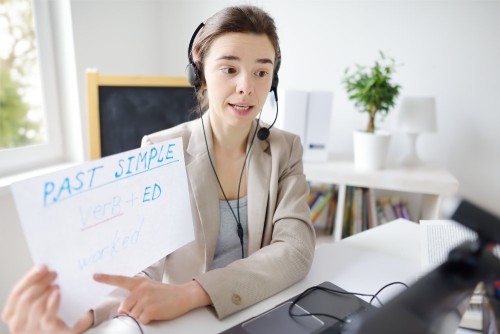 woman-is-teaching-english-with-laptop.jpg